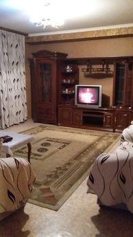 The apartment is located on the bank of the river to them. E