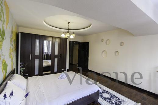Lovely apartment in Dostyk, Алмати - апартамент за нощувки
