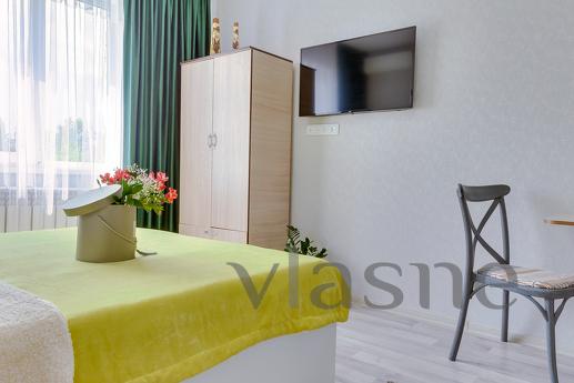 Cozy bright studio on Abaya-Saina, Алмати - апартамент за нощувки
